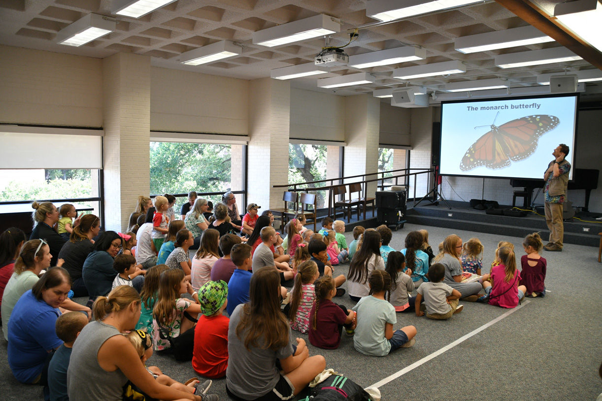 Singing zoologist Lucas Miller visits Bryan library